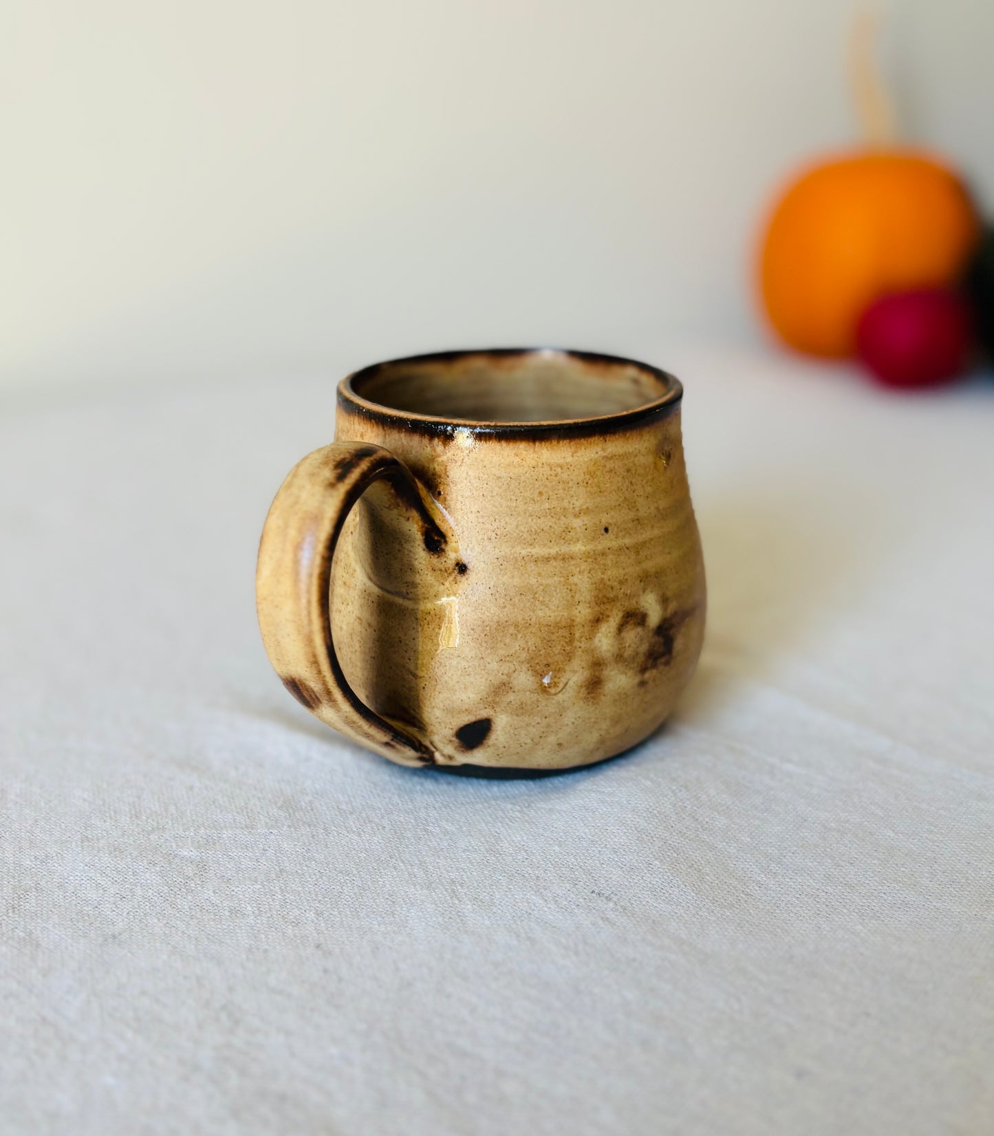 Matte Ginger Mug on Black Stoneware